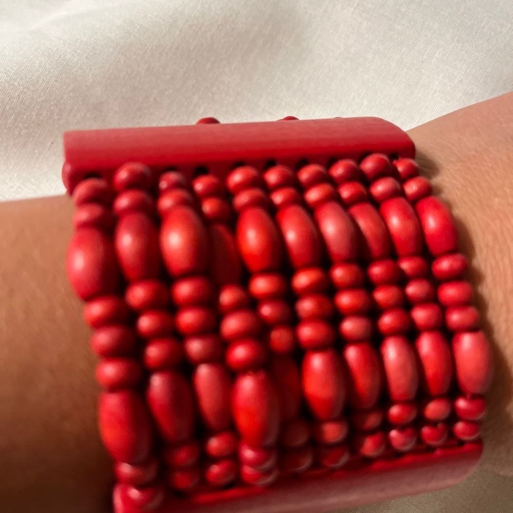Wide Red Multi Strand Wood Cleo Stretch Bead Cuff Bracelet. 
Good used condition
